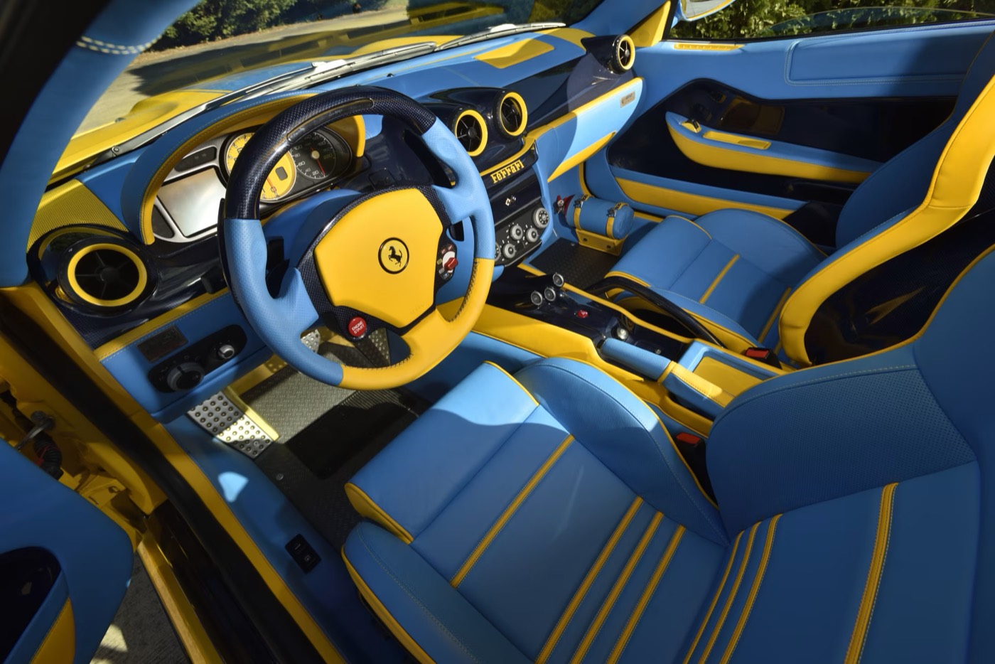 Blue-and-yellow leather interior of a Ferrari 599